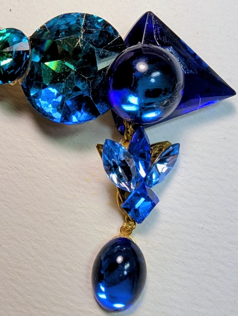 Wendy Gell brooch Swarovsky jewels in blue with dangle.